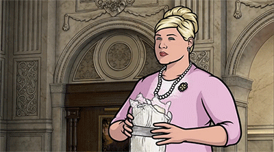 A GIF of Pam Poovey putting her face in a bag of cocaine.